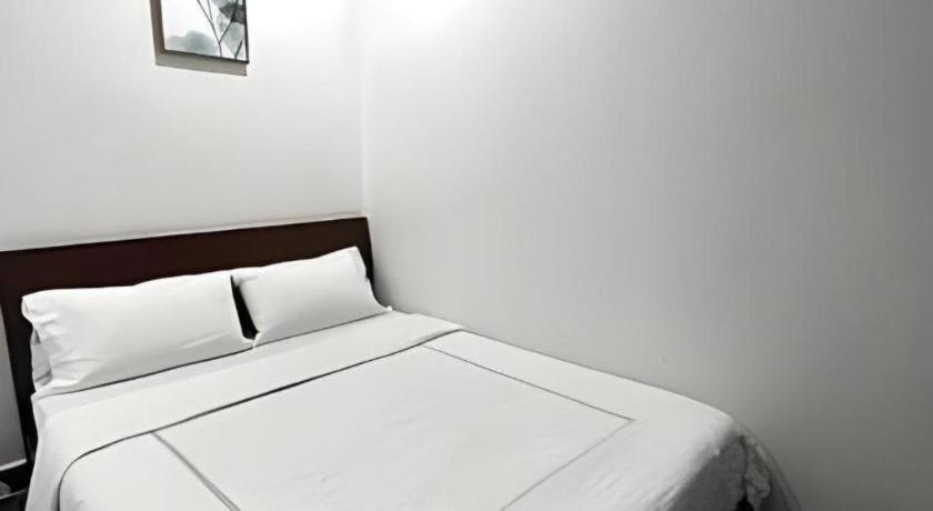 Oyo 90936 Hotel Manjoi Inn Ipoh Bagian luar foto